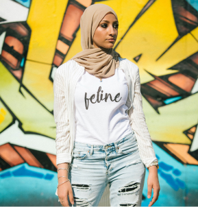 white t-shirt with the word feline written in a black cursive font